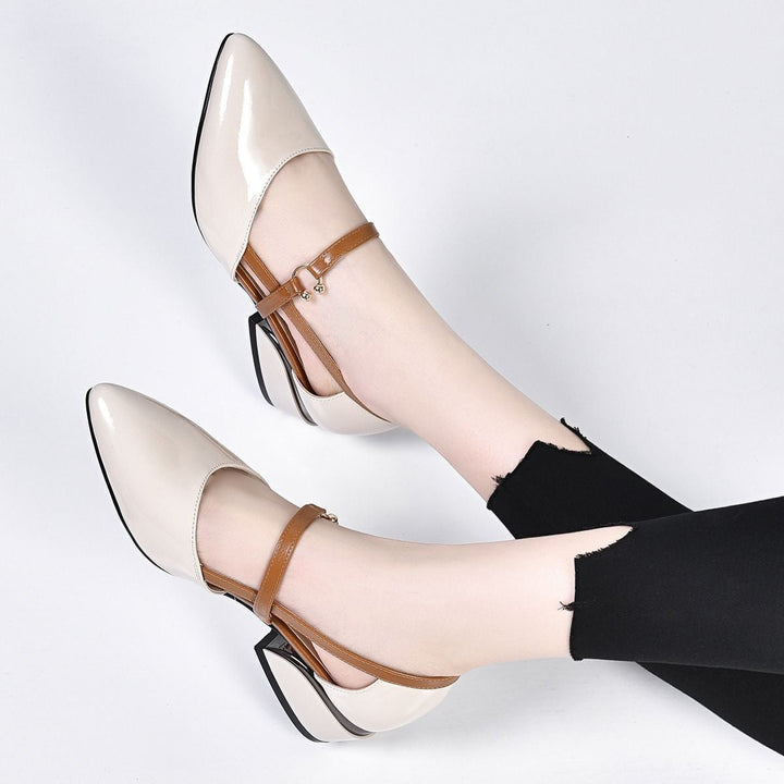 Livia Cove Pointed-Toe Slingback Pumps by Modioza