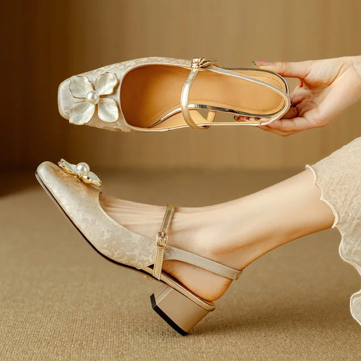 Adeline Cove Slingback Pumps by Modioza