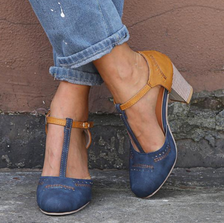 Hazel May T-Strap Pumps by Modioza